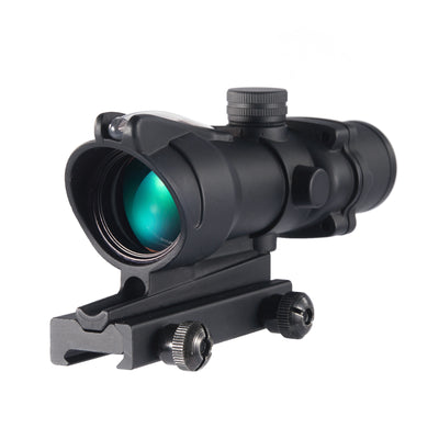 Black rifle scope with green lens on a white background